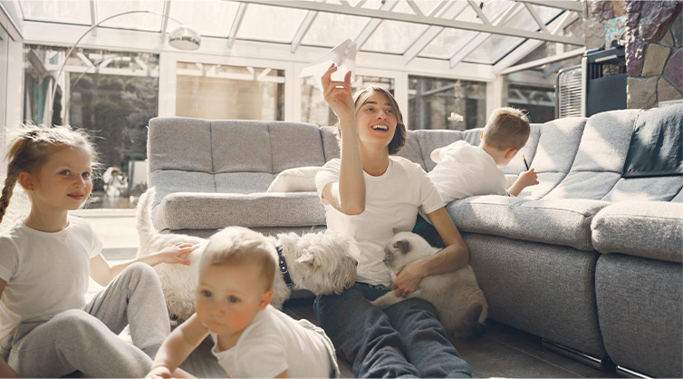 A-woman-surrounded-by-her-human-and-fur-kids